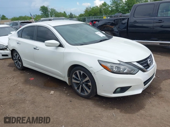 2016 Nissan Altima S z VIN 1N4AL3AP0GC174433, wystawiony jako IAAI lot #42257840 z przebiegiem 122 158 mil mil oraz . Historia ofert i sprzedaży dostępna na DreamBid. Obrazek 1.