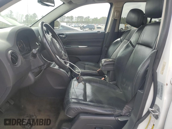 2016 Jeep Compass Latitude with VIN 1C4NJDEBXGD767720, listed as a Copart auction lot 51644975 with 170,096 mi miles and Clean Title. Bid and sale history available at carsss.com. Image 7.