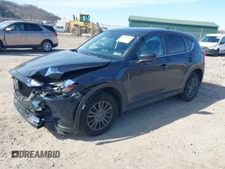 2019 Mazda CX-5 Touring with VIN JM3KFBCM8K0518806, listed as a IAAI auction lot 42038168 with 61,449 mi miles and . Bid and sale history available at DreamBid. Image 17.