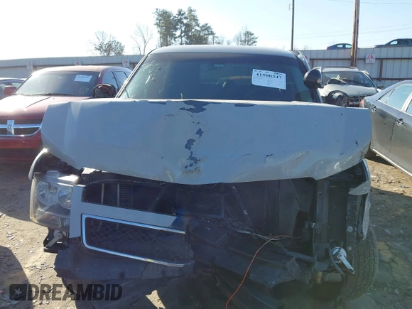 2009 Chevrolet Tahoe Police z VIN 1GNEC03009R163269, wystawiony jako IAAI lot #41500347 z przebiegiem 174 609 mil mil oraz . Historia ofert i sprzedaży dostępna na DreamBid. Obrazek 6.