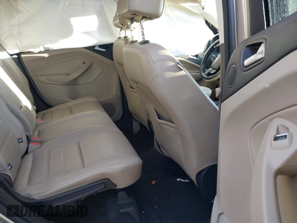 2017 Ford Escape Titanium with VIN 1FMCU0JD0HUB79739, listed as a IAAI auction lot 41807975 with 121,902 mi miles. Bid and sale history available at carsss.com. Image 8.