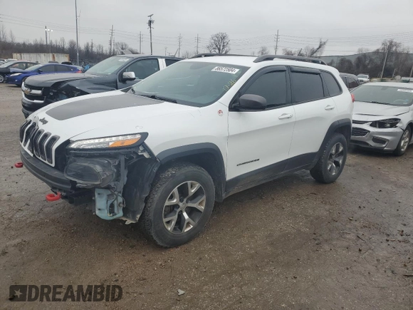 2015 Jeep Cherokee Trailhawk z VIN 1C4PJMBS9FW698857, wystawiony jako Copart lot #86572504 z przebiegiem 143 919 mil mil oraz Czysty tytuł • Clean title. Historia ofert i sprzedaży dostępna na DreamBid. Obrazek 1.