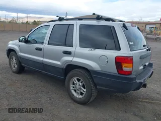 2004 Jeep Grand Cherokee Laredo with VIN 1J4GW48N14C434351, listed as a IAAI auction lot 41860077 with 152,404 mi miles and . Bid and sale history available at DreamBid. Image 3.
