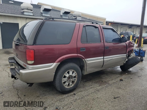 2001 GMC Jimmy SLT with VIN 1GKDT13W512219142, listed as a Copart auction lot 85045234 with 0 mi miles and Salvage Title. Bid and sale history available at carsss.com. Image 3.