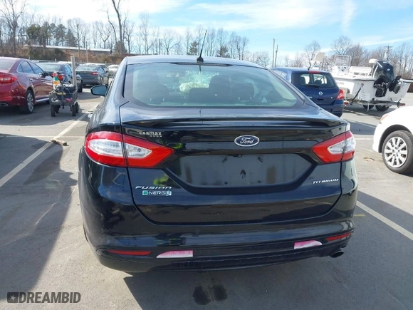 2016 Ford Fusion Energi Titanium with VIN 3FA6P0SU5GR401632, listed as a IAAI auction lot 41540328 with 116,087 mi miles. Bid and sale history available at carsss.com. Image 16.
