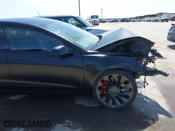 2022 Tesla Model 3 Performance with VIN 5YJ3E1EC6NF104475, listed as a IAAI auction lot 41734724 with 31,717 mi miles and . Bid and sale history available at carsss.com. Image 20.