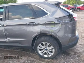 2021 Ford Edge Titanium z VIN 2FMPK3K9XMBA21766, wystawiony jako IAAI lot #42187940 z przebiegiem 79 732 mil mil oraz . Historia ofert i sprzedaży dostępna na DreamBid. Obrazek 17.