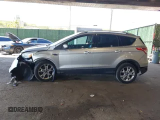 2016 Ford Escape Titanium с VIN 1FMCU9JX3GUB75889, выставлен на аукционе IAAI как лот 42188565 с пробегом 121 638 миль миль и . История ставок и продаж доступна на DreamBid. Изображение 14.