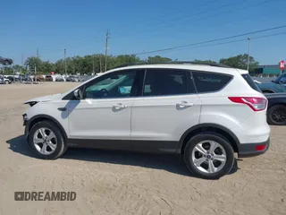 2014 Ford Escape SE with VIN 1FMCU0G94EUA35464, listed as a IAAI auction lot 42046944 with 88,504 mi miles. Bid and sale history available at carsss.com. Image 15.