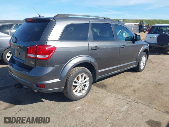 2015 Dodge Journey SXT with VIN 3C4PDCBG9FT696593, listed as a IAAI auction lot 41600713 with 139,763 mi miles. Bid and sale history available at carsss.com. Image 4.