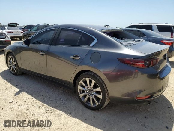 2021 Mazda 3 Premium with VIN JM1BPADL9M1319945, listed as a Copart auction lot 52902425 with 74,221 mi miles and Salvage title. Bid and sale history available at DreamBid. Image 2.