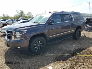 2016 Chevrolet Suburban LT z VIN 1GNSKHKC1GR198058, wystawiony jako Copart lot #56909335 z przebiegiem 150 907 mil mil oraz Szkoda całkowita • Salvage title. Historia ofert i sprzedaży dostępna na DreamBid. Obrazek 1.