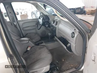 2003 Jeep Liberty Sport with VIN 1J4GK48K13W633818, listed as a IAAI auction lot 41962552 with 217,884 mi miles and . Bid and sale history available at DreamBid. Image 5.