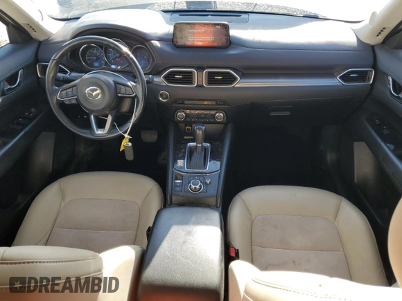 2017 Mazda CX-5 Touring with VIN JM3KFBCL2H0204097, listed as a Copart auction lot 88173195 with 76,884 mi miles and Salvage Title. Bid and sale history available at carsss.com. Image 8.
