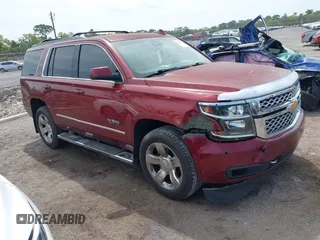 2017 Chevrolet Tahoe LT z VIN 1GNSCBKC1HR236951, wystawiony jako IAAI lot #41866725 z przebiegiem 138 011 mil mil oraz . Historia ofert i sprzedaży dostępna na DreamBid. Obrazek 1.