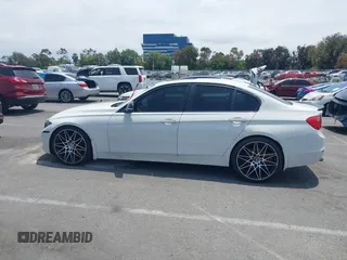 2014 BMW 3 Series 328i with VIN WBA3C1C52EK110753, listed as a IAAI auction lot 42444129 with 169,035 mi miles and . Bid and sale history available at DreamBid. Image 14.