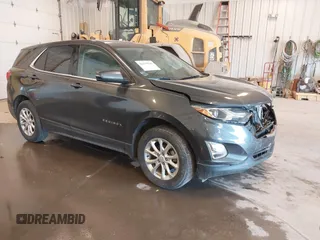 2018 Chevrolet Equinox LT z VIN 2GNAXSEVXJ6345570, wystawiony jako IAAI lot #42113526 z przebiegiem 145 631 mil mil oraz . Historia ofert i sprzedaży dostępna na DreamBid. Obrazek 1.