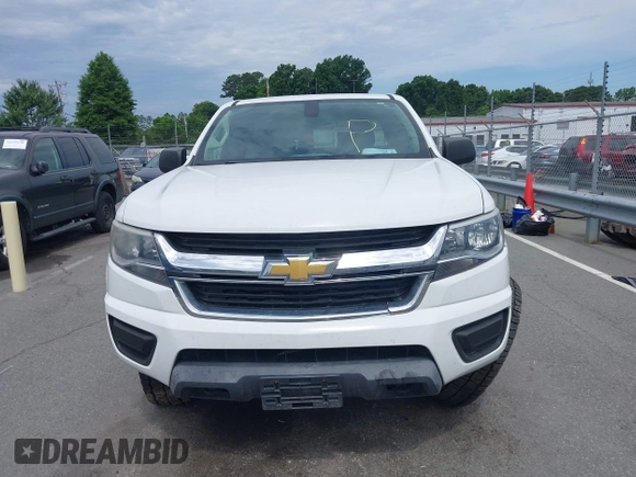 2019 Chevrolet Colorado 4WD Work Truck z VIN 1GCHTBEA5K1221307, wystawiony jako IAAI lot #42273653 z przebiegiem 94 746 mil mil oraz . Historia ofert i sprzedaży dostępna na DreamBid. Obrazek 12.