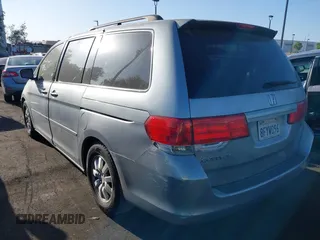 2010 Honda Odyssey EX with VIN 5FNRL3H41AB016671, listed as a IAAI auction lot 42465200 with 167,214 mi miles and . Bid and sale history available at DreamBid. Image 3.