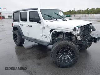 2019 Jeep Wrangler Unlimited Sport Altitude with VIN 1C4HJXDG3KW528647, listed as a IAAI auction lot 40986538 with 85,381 mi miles and . Bid and sale history available at DreamBid. Image 14.