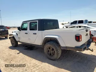 2023 Jeep Gladiator Sport S with VIN 1C6HJTAG4PL564716, listed as a Copart auction lot 57489125 with 20,971 mi miles and Salvage title. Bid and sale history available at DreamBid. Image 2.
