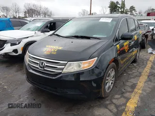 2012 Honda Odyssey EX-L with VIN 5FNRL5H64CB142247, listed as a IAAI auction lot 41722015 with 179,637 mi miles and . Bid and sale history available at carsss.com. Image 2.