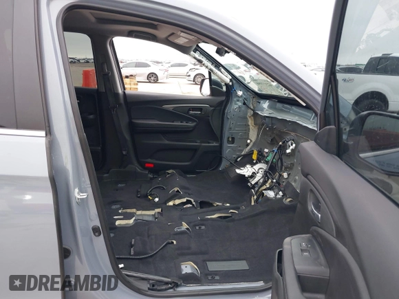 2023 Honda Ridgeline RTL with VIN 5FPYK3F58PB047099, listed as a IAAI auction lot 42313390 with Not provided miles and . Bid and sale history available at DreamBid. Image 5.