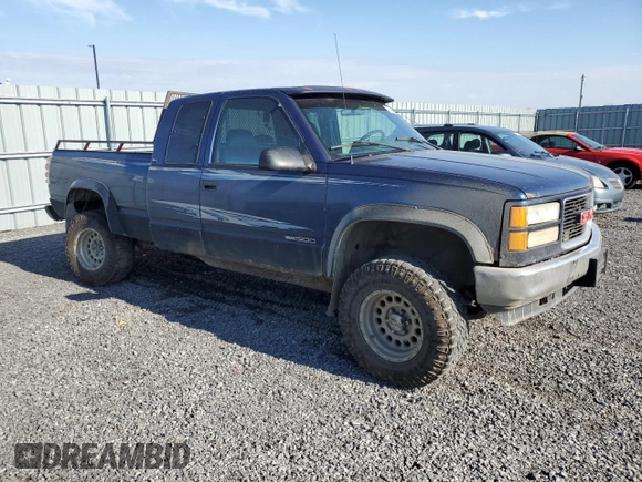 1995 GMC Sierra 1500 z VIN 2GTEK19K3S1591653, wystawiony jako Copart lot #75799124 z przebiegiem 329 311 mil mil oraz Nie do naprawy. Historia ofert i sprzedaży dostępna na DreamBid. Obrazek 4.
