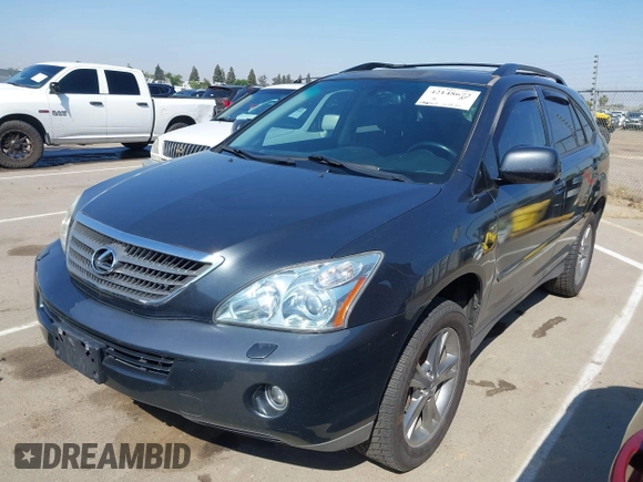 2006 Lexus RX 400h with VIN JTJHW31U560009707, listed as a IAAI auction lot 42148672 with 198,569 mi miles and . Bid and sale history available at DreamBid. Image 2.