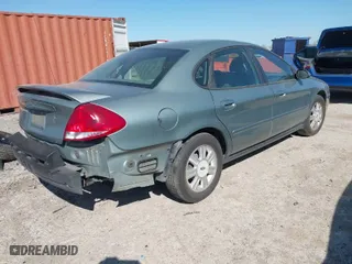 2007 Ford Taurus SEL with VIN 1FAFP56U97A130690, listed as a IAAI auction lot 41841077 with 131,516 mi miles. Bid and sale history available at carsss.com. Image 4.