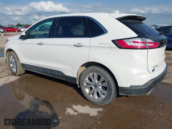 2020 Ford Edge Titanium z VIN 2FMPK3K98LBA42159, wystawiony jako IAAI lot #42358229 z przebiegiem 88 512 mil mil oraz . Historia ofert i sprzedaży dostępna na DreamBid. Obrazek 3.