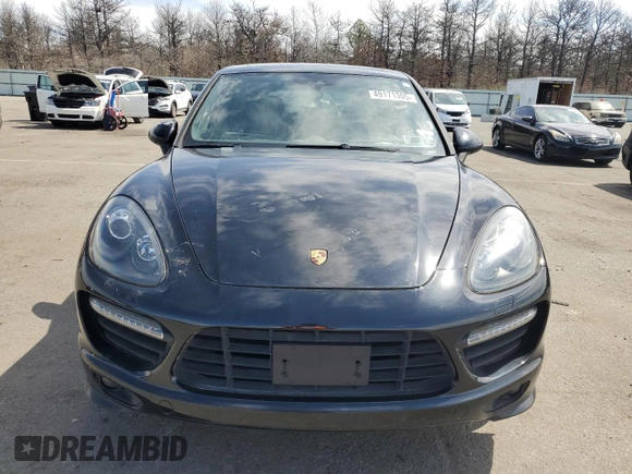 2014 Porsche Cayenne GTS z VIN WP1AD2A26ELA77822, wystawiony jako Copart lot #49171305 z przebiegiem Nie podano mil oraz Czysty tytuł • Clean title. Historia ofert i sprzedaży dostępna na DreamBid. Obrazek 5.