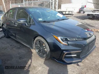 2021 Toyota Corolla SE with VIN 5YFS4MCE1MP082859, listed as a IAAI auction lot 41774673 with 34,006 mi miles. Bid and sale history available at carsss.com. Image 1.