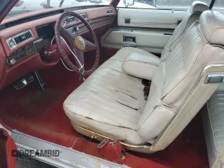 1974 Cadillac Eldorado z VIN 6L67S4Q408046, wystawiony jako Copart lot #77112024 z przebiegiem 97 414 mil mil oraz Szkoda całkowita • Salvage title. Historia ofert i sprzedaży dostępna na DreamBid. Obrazek 7.
