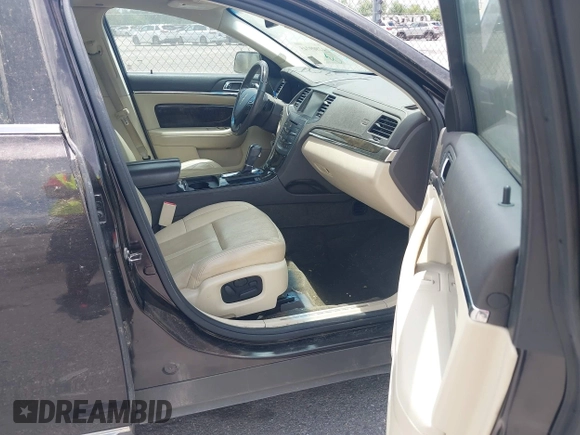 2014 Lincoln MKS with VIN 1LNHL9DK0EG605429, listed as a IAAI auction lot 42809745 with 127,038 mi miles and . Bid and sale history available at DreamBid. Image 5.