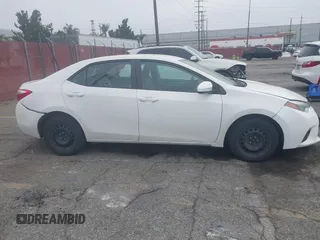 2015 Toyota Corolla L z VIN 5YFBURHE4FP204526, wystawiony jako IAAI lot #42503462 z przebiegiem 143 684 mil mil oraz . Historia ofert i sprzedaży dostępna na DreamBid. Obrazek 14.