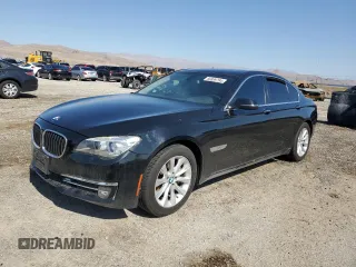 2015 BMW 7 Series 740i with VIN WBAYA6C5XFD826895, listed as a Copart auction lot 66889794 with Not Provided miles and Salvage Title. Bid and sale history available at carsss.com. Image 1.