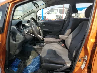2011 Honda Fit Sport with VIN JHMGE8H59BC007883, listed as a Copart auction lot 54194635 with 123,256 mi miles and Salvage Title. Bid and sale history available at DreamBid. Image 7.