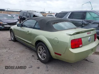 2005 Ford Mustang Deluxe with VIN 1ZVFT84N555249312, listed as a IAAI auction lot 42145721 with 334,417 mi miles. Bid and sale history available at carsss.com. Image 3.