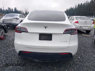 2022 Tesla Model Y Long Range z VIN 7SAYGDEE6NF451259, wystawiony jako IAAI lot #41200775 z przebiegiem 59 683 mil mil oraz . Historia ofert i sprzedaży dostępna na DreamBid. Obrazek 17.