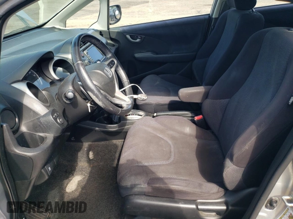 2011 Honda Fit Sport z VIN JHMGE8H67BC001041, wystawiony jako Copart lot #56109445 z przebiegiem 159 747 mil mil oraz Szkoda całkowita • Salvage title. Historia ofert i sprzedaży dostępna na DreamBid. Obrazek 7.