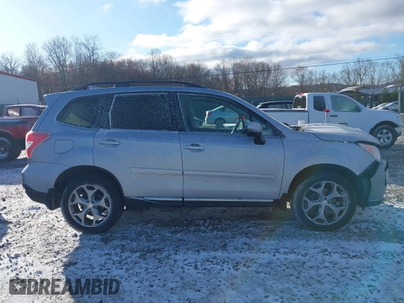 2016 Subaru Forester Touring z VIN JF2SJAXC4GH536085, wystawiony jako IAAI lot #41838081 z przebiegiem 155 930 mil mil oraz . Historia ofert i sprzedaży dostępna na DreamBid. Obrazek 13.