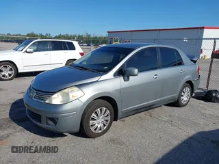 2009 Nissan Versa 1.8 S with VIN 3N1BC11E09L377706, listed as a IAAI auction lot 42027981 with 146,105 mi miles. Bid and sale history available at carsss.com. Image 2.