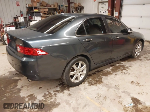 2005 Acura TSX with VIN JH4CL96975C034682, listed as a IAAI auction lot 41596405 with 228,889 mi miles and . Bid and sale history available at DreamBid. Image 4.