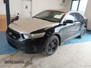 2013 Ford Police Interceptor with VIN 1FAHP2M87DG124585, listed as a IAAI auction lot 41863360 with 189,705 mi miles and . Bid and sale history available at DreamBid. Image 2.