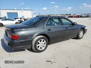 2002 Cadillac Seville Luxury SLS z VIN 1G6KS54YX2U154438, wystawiony jako Copart lot #67893314 z przebiegiem 115 313 mil mil oraz Szkody całkowita. Historia ofert i sprzedaży dostępna na DreamBid. Obrazek 3.