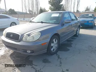 2004 Hyundai Sonata with VIN KMHWF25S84A944266, listed as a IAAI auction lot 41723386 with 159,849 mi miles. Bid and sale history available at carsss.com. Image 2.