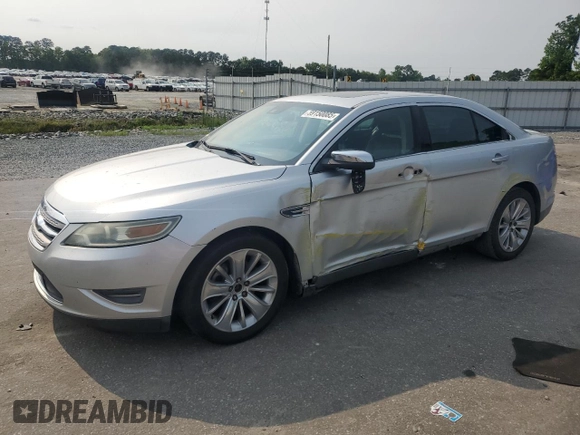 2010 Ford Taurus Limited with VIN 1FAHP2FWXAG149570, listed as a Copart auction lot 59150085 with 201,632 mi miles and Salvage title. Bid and sale history available at DreamBid. Image 1.