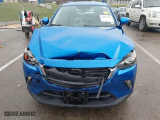 2016 Mazda CX-3 Touring with VIN JM1DKBC77G0112529, listed as a IAAI auction lot 41852258 with 134,412 mi miles. Bid and sale history available at carsss.com. Image 6.