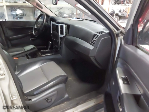 2010 Jeep Grand Cherokee Laredo with VIN 1J4PR4GK9AC160097, listed as a IAAI auction lot 41883264 with 240,409 mi miles. Bid and sale history available at carsss.com. Image 5.